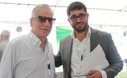 ארנון מעוז, מנכ"ל תשתיות. אמיר חייק, מנכ"ל התאחדות התעשיינים. ועידת תעשיית העתיד הרביעית. צילום: תומר קזיניץ